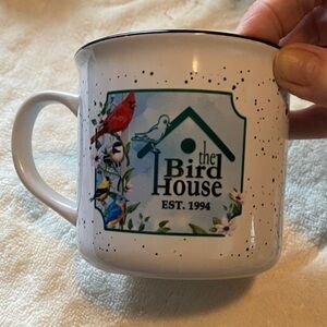 White Speckled Mug with Bird Design